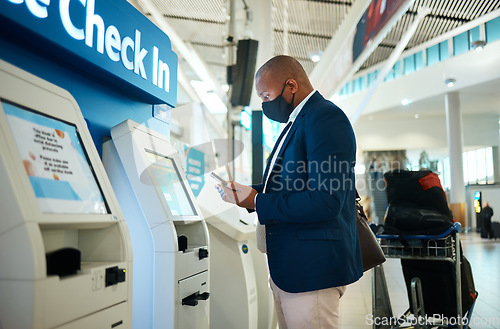 Image of Black man, face mask and plane self check in with phone app with airport information for travel. International flight data, businessman and luggage of a employee reading mobile info for airplane