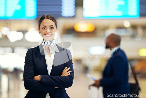 Image of Woman, airport and service agent with arms crossed standing ready with smile in FAQ, help or direction. Portrait of happy female airline passenger assistant smiling for immigration or travel services