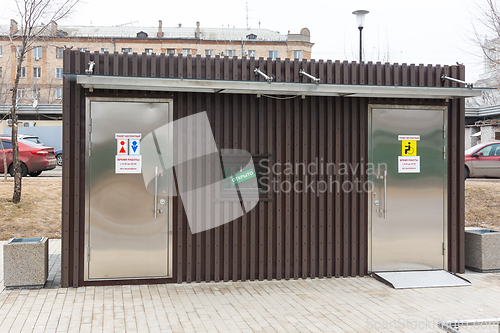 Image of The building of a free street toilet with a cabin for the disabled