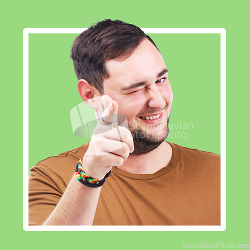 Image of Winking, pointing and smile with portrait of man for winner, emoji and success motivation. Happy, thank you and friendly with face of guy and positive gesture for yes, opportunity and goal in frame