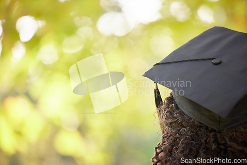 Image of Graduation cap, trees and back of woman outdoor for education achievement, success and goals with bokeh. Nature, mockup space and female university or college graduate planning future for motivation.