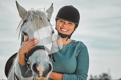 Image of Smile, horse and relax with portrait of woman in countryside for adventure, race and embrace. Happy, care and equestrian with girl jockey and pet and affection on ranch for travel, therapy or animal