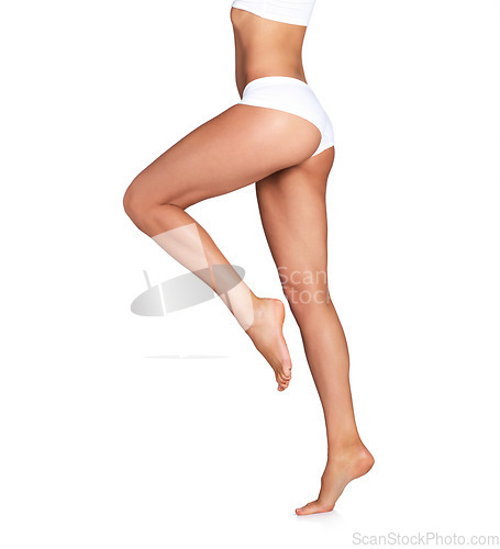 Image of Beauty, legs and woman with mockup in studio for skincare, smooth and soft perfection on white background. Feet, leg and girl model in underwear for skin, glow and luxury wellness while isolated