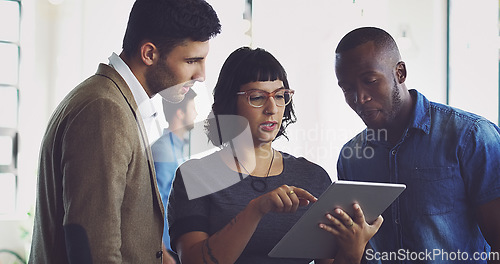 Image of Digital tablet, planning and business people in the office doing research for a corporate project together. Collaboration, professional and team of employees working on a report on a mobile device.