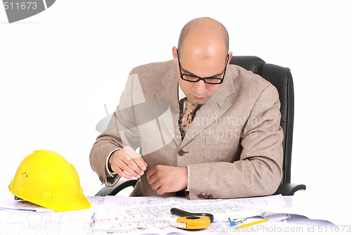 Image of Businessman with architectural plans 