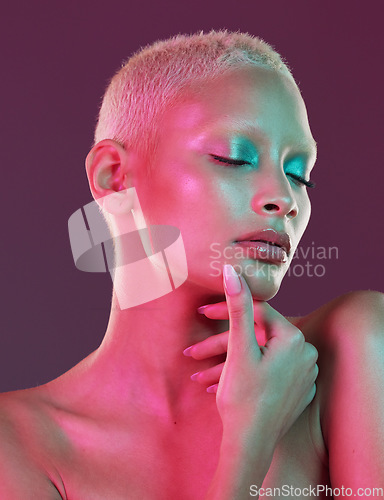 Image of Skincare, neon beauty and woman with eyes closed, makeup and lights in creative advertising on studio background. Cyberpunk, art girl and model isolated in futuristic skin care mock up space