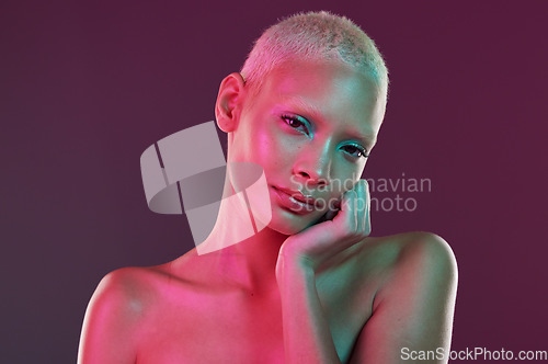 Image of Skincare, neon face and portrait of woman with makeup and lights for creative advertising on studio background. Cyberpunk, gen z girl and model isolated for beauty and futuristic mock up space