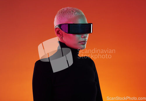 Image of Woman, vr glasses and metaverse for augmented reality, digital transformation and future tech. Cyberpunk person on orange background with ar software headset for 3d and cyber world user experience