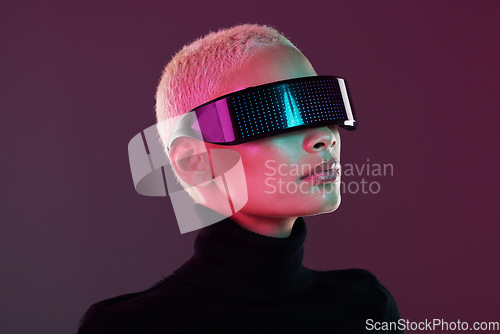 Image of Vr glasses, woman and metaverse for futuristic gaming, digital transformation and tech. Cyberpunk person face on studio background with virtual or augmented reality headset for 3d and cyber world ux