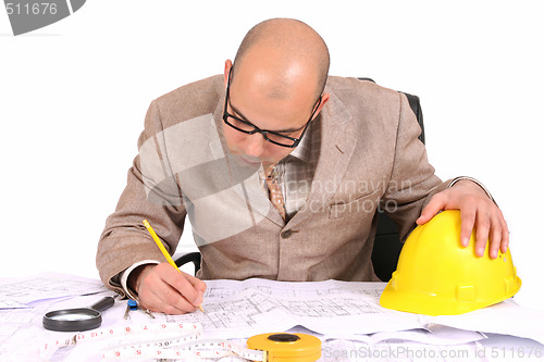Image of Businessman with architectural plans 