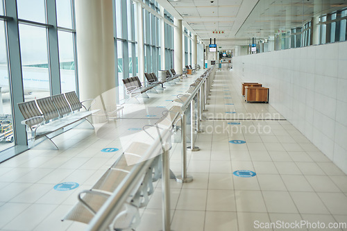 Image of Background of empty airport, lounge hallway and chair furniture in waiting room of departure gate for global journey. Airplane lobby, seat or space of commercial flight, building interior or terminal