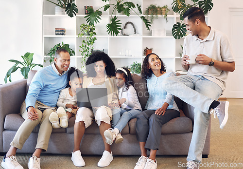 Image of Home, big family and laptop on couch learning with online education, games or movie. Parents, grandparents and children relax together on sofa with internet for quality time streaming and bonding