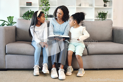 Image of Senior family reading books to children, teaching and learning bible story, questions and education in living room. Grandmother and kids on sofa with storytelling or holy religion, knowledge and help