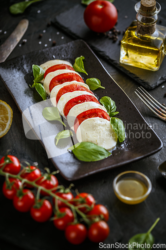 Image of Traditional italian tomato salad caprese