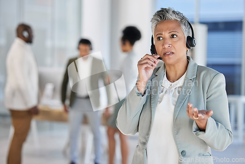 Image of Senior woman, call center and talk with manager, confused and question at customer service job. Crm expert, group and leader with consultation by blurred background for help, faq and telemarketing