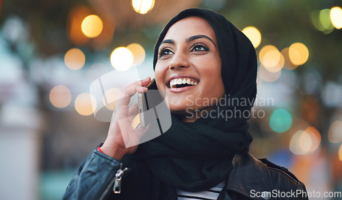 Image of Muslim, phone call and woman talking in city, chatting or speaking to contact in Dubai. Night bokeh, thinking or happy Islamic girl on 5g mobile smartphone for networking or conversation with hijab