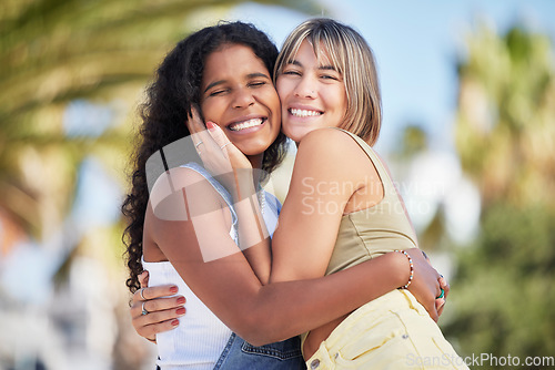 Image of Portrait, friends and hug outdoors for travel, vacation and summer holiday against blurred background. Face, happy and women embrace on a trip in Miami, smile and relax while on an adventure together