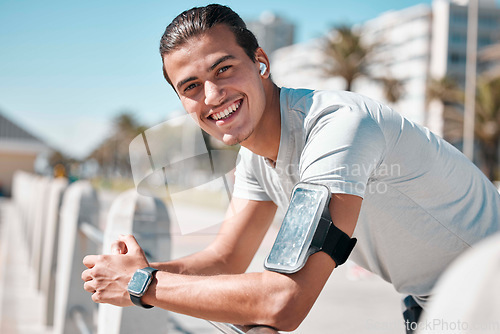 Image of Fitness, exercise and portrait of man with smile to start workout, training and running in Miami. Happy sports guy, runner and outdoor motivation for strong wellness, marathon energy and cardio power