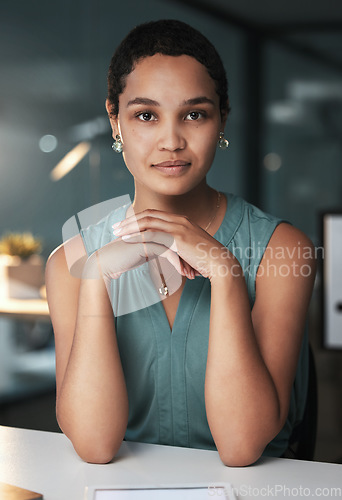 Image of Consultant, entrepreneur and portrait of a businesswoman with focus and serious late night or evening in an office. Confident, black woman and corporate face at a startup company or small business