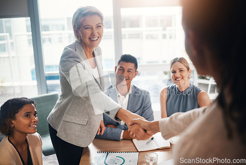 Image of Ceo meeting, success or business people shaking hands after a contract agreement for working together. Diversity, company and happy management welcome a worker in a new partnership deal in office