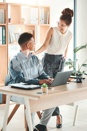 Image of Office, man and woman at desk, support and motivation from management at startup, working together on project. Laptop, ideas and partnership, Businessman and mentor in collaboration on job proposal.
