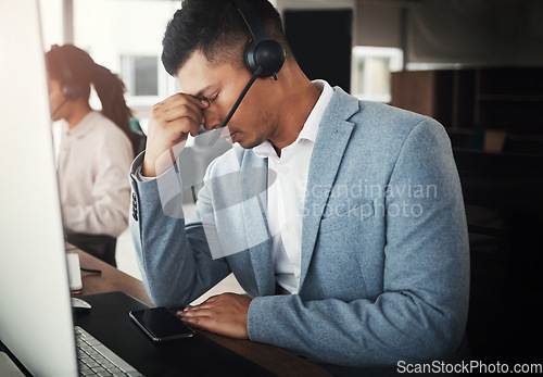 Image of Customer service consulting, stress headache or man telemarketing on contact us CRM or telecom microphone. Call center burnout, web ecommerce or information technology consultant with medical crisis