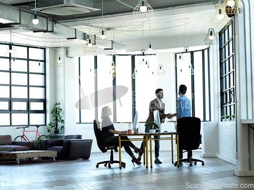 Image of Business meeting, handshake and accounting company collaboration at workplace for finance deal, b2b work partnership and working accountants with thank you hand gesture for crm contract discussion