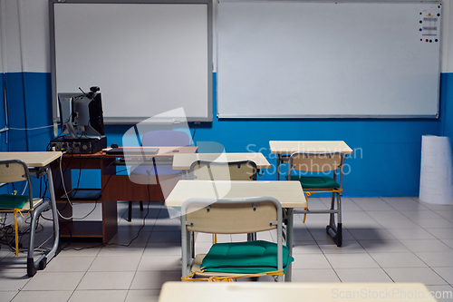 Image of Empty chairs in classrom. Modern furniture. Interior of cafe. Conference hall.