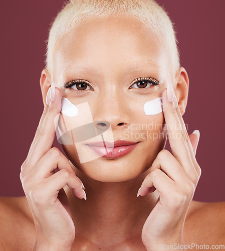 Image of Skincare, beauty and portrait of woman with cream on face, cosmetics and makeup on studio background. Dermatology, spa facial treatment and model isolated with mock up, anti ageing care and glow.