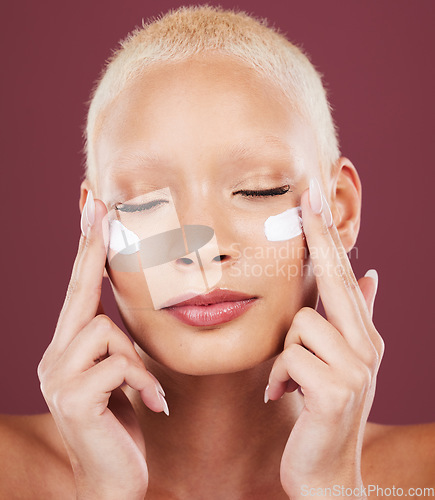 Image of Skincare, beauty and portrait of woman with closed eyes and cream, cosmetics and skin product on studio background. Dermatology, facial treatment and model isolated with mockup and anti ageing glow