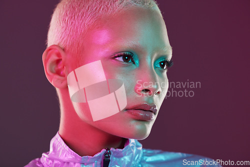 Image of Vaporwave profile, black woman and cyberpunk cosmetics with model thinking in a studio. Isolated, glow makeup and futuristic cyber fashion of a young person with chrome clothing and scifi design