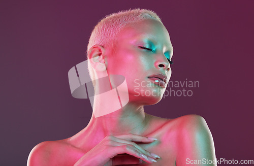 Image of Art, neon beauty and woman with eyes closed, makeup and lights in creative advertising on studio background. Cyberpunk, aesthetic or fantasy girl and model isolated in futuristic skincare mock up