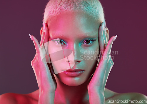 Image of Cyberpunk, art and cosmetics, portrait of woman with neon makeup and lights in creative advertising on studio background. Fantasy girl, model face and futuristic skincare and beauty mockup space