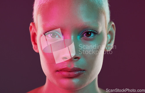 Image of Beauty, neon face and portrait of woman with makeup and lights for creative advertising on studio background. Cyberpunk, art girl or fantasy model isolated for skincare and futuristic mock up space