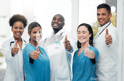 Image of Nurses, doctors and thumbs up portrait of healthcare team for success, support and thank you. Hand sign of diversity women and men happy for medical teamwork in hospital with trust and care