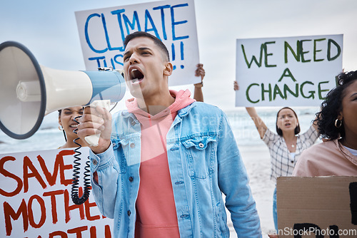 Image of Protest, climate change and megaphone with man at the beach for environment, earth day and action. Global warming, community and stop pollution with activist for social justice, support and freedom