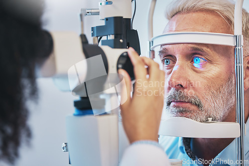 Image of Ophthalmology, medical and eye exam with old man and consulting for vision, healthcare and glaucoma check. Laser, light and innovation with face of patient and machine for scanning and optometry
