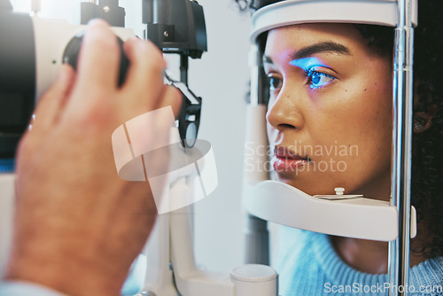 Image of Ophthalmology, healthcare and eye exam with black woman and consulting for vision, medical and glaucoma check. Laser, light and innovation with face of patient and machine for scanning and optometry