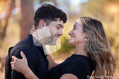 Image of Love, real couple outdoor and hug for relationship, vacation and quality time on break, relax and romance. Romantic man and happy woman embrace, loving and bonding together on date with affection