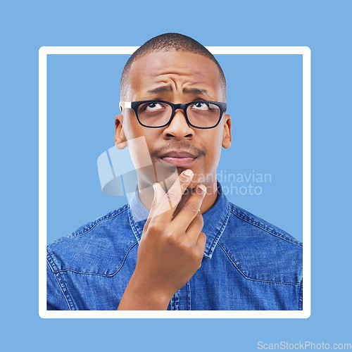 Image of Confused, thinking and black man in studio with frame, mockup and blue background space. Doubt, unsure and contemplation with a guy thoughtful in border, pensive or emoji collage while isolated