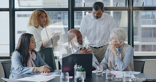 Image of Laptop, CEO or senior business people in meeting planning a marketing strategy for company financial growth. Innovation, leadership or executive employees working in a partnership for kpi sales goals