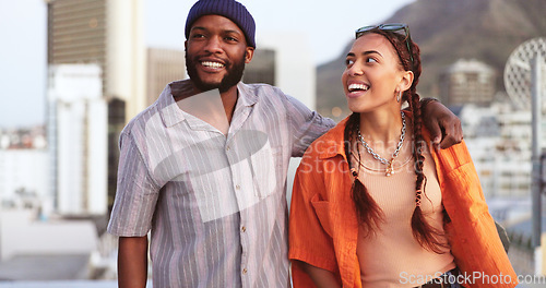 Image of Comic, communication and interracial couple walking in the city, talking and on a date together. Happy, smile and black man and woman in a funny, comedy and crazy conversation while on a walk