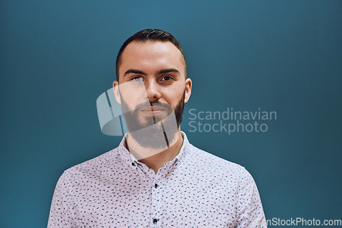 Image of A bearded man portrati isolation on dark blue background