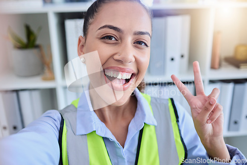 Image of Selfie, peace sign and woman in office, leadership and happiness for business deal, growth and development. Portrait, female employee and engineer workplace, celebration and gesture for achievement