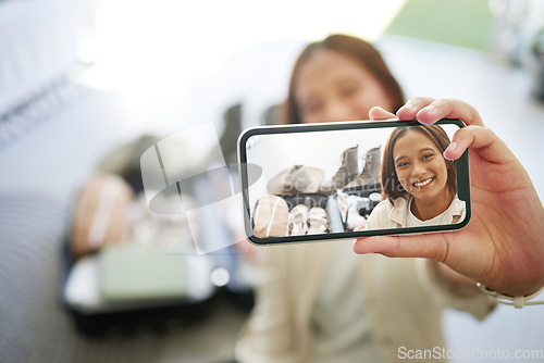 Image of Selfie, hand and girl with a phone for travel, hotel bedroom and memory of a vacation. Smile, freedom and influencer girl with a mobile photo during a holiday for social media and live streaming