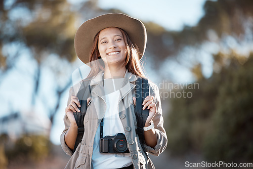 Image of Portrait, hiking and woman in nature, fitness and exercise for wellness, fresh air or freedom. Face, female tourist in forest or lady in mountains, hiker or on holiday for adventure, journey or relax