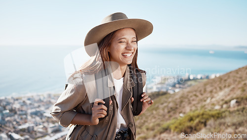 Image of Happy, hiking and woman laughing with travel, outdoor in nature with freedom and fitness, funny and active lifestyle. Female hiker on mountain, joke and person with adventure, happiness and care free