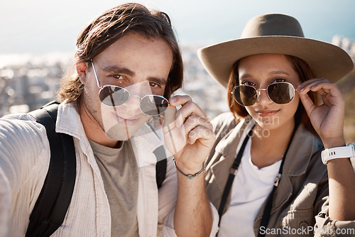 Image of Selfie, hiking and couple on vacation, adventure and wellness with fitness, romance and cheerful. Portrait, romantic man and woman with sunglasses, hikers or journey for summer holiday, break or love