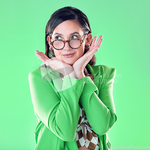 Image of Woman, teacher and hands on face with green screen, studio background and thinking with vision for career. Young model, education and ideas with glasses, mockup and with fashion, pride and happiness