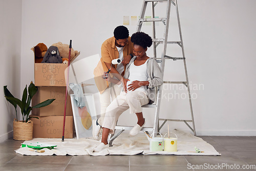 Image of Painting, pregnancy or home with a black couple in DIY, renovation or house remodel with a paintbrush or roller. Teamwork, partners or African man and pregnant woman excited about baby or new family